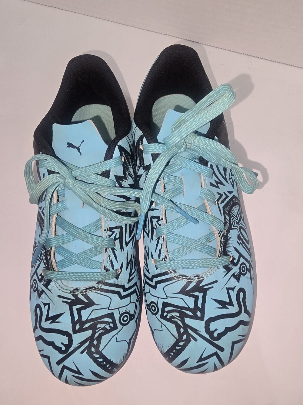 Puma x Christian Pulisic Tacto II Soccer CleatsBlue/Black graphic print US 4Y